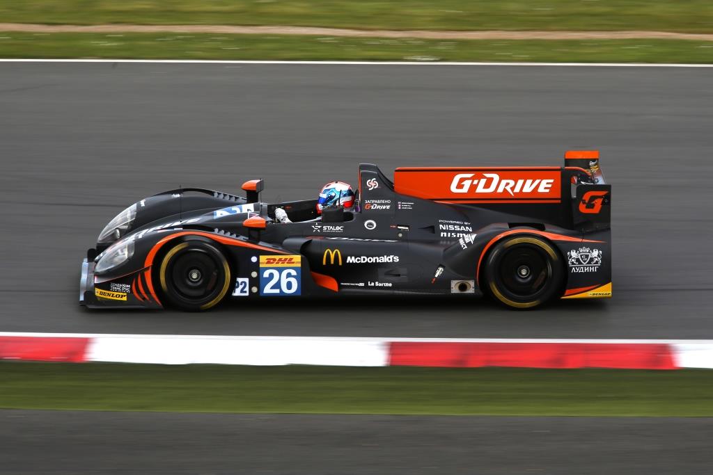 Гоночный автомобиль за 6 часов. Nissan lmp2 2014. G Drive рейсинг. Болид g-Drive Racing. Болид g Drive гоночный.